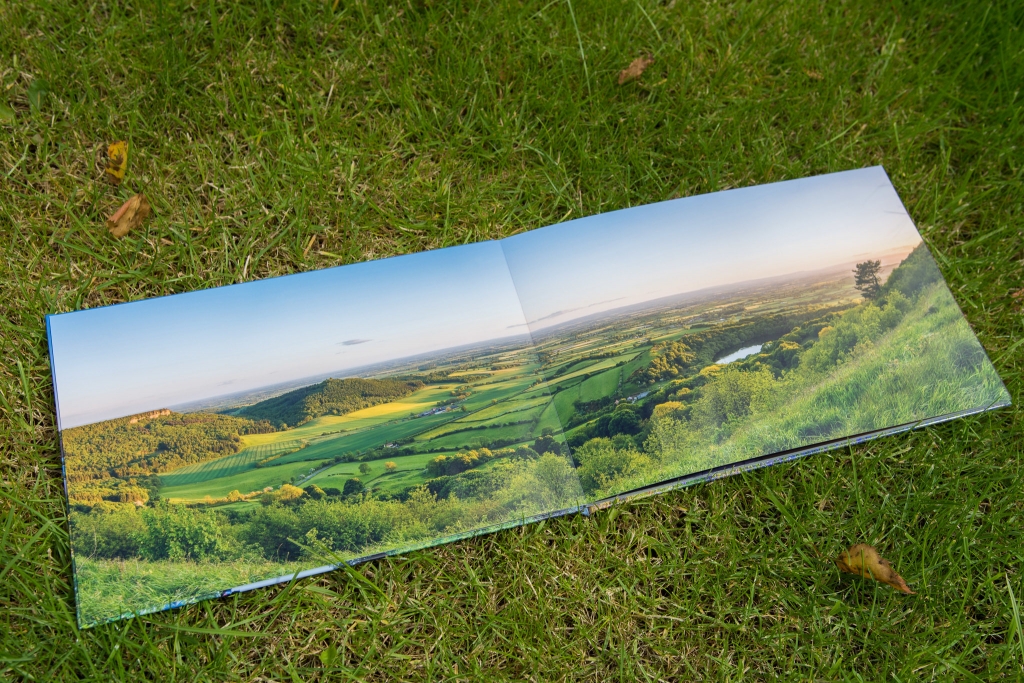 Panorama of Sutton Bank spanned across two pages